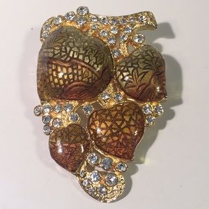 Vintage signed SJ gold enamel brooch